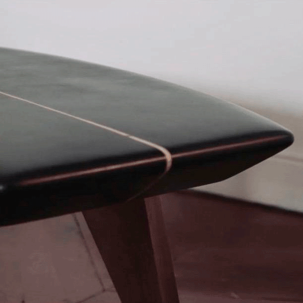 b59 Black surfboard table closeup salty home coastal design